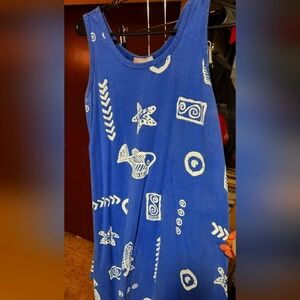 Kisses and Hugs dress size L. Blue knit fabric with shell/fish design.